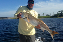 captain larry holding a fish