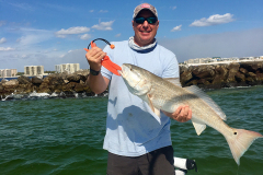captain larry holding a fish